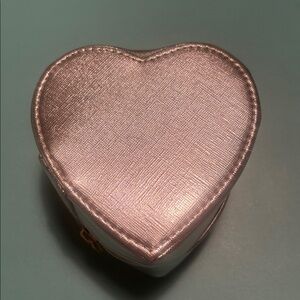 Heart-Shaped Metallic Silver case.